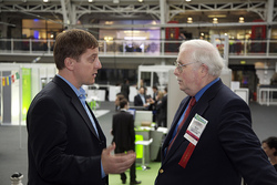 Dr. Ralph Wilson (right) talks with SES conference attendee